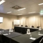 Meeting room at Darwin Airport set up for a business conference.